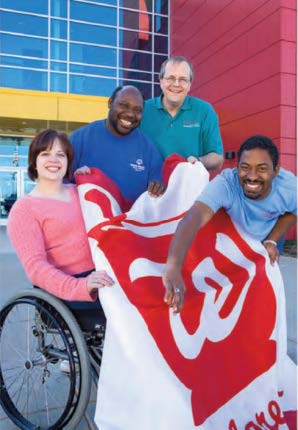 People holding Walgreen banner