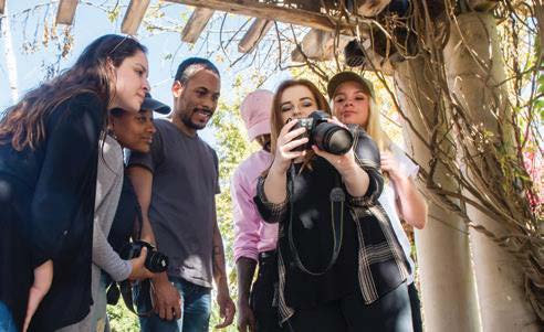 Kids viewing pictures on a camera