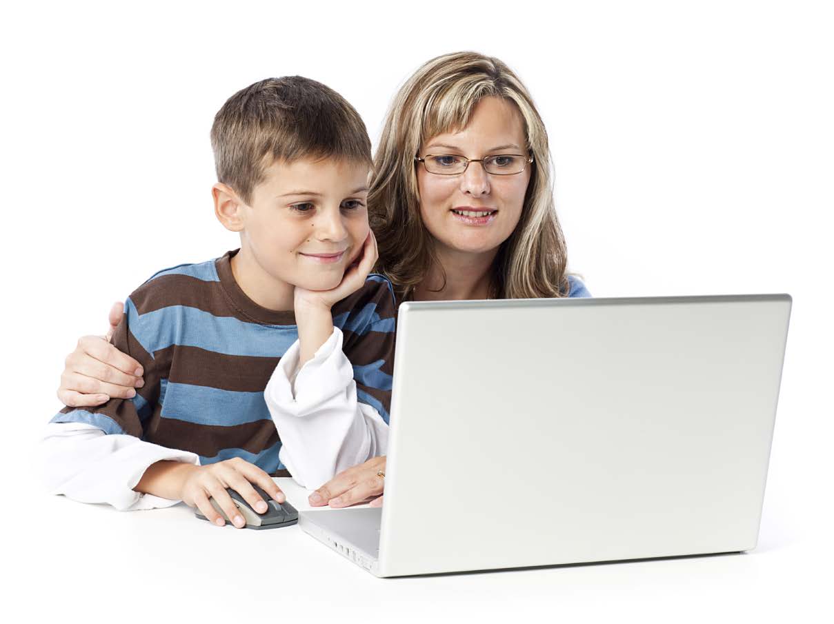 WOMAN AND BOY USING LAPTOP COMPUTER