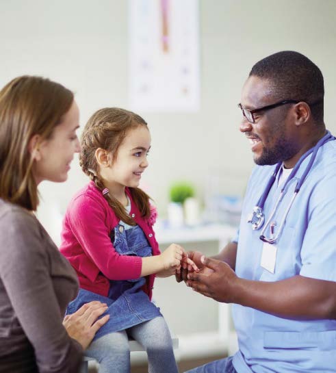 doctor speaking to patient and parent