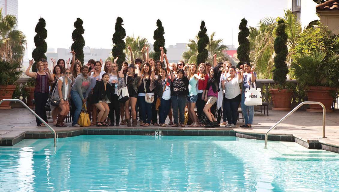 students in front of pool