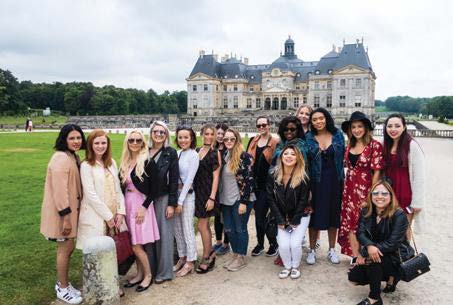 Students in front of mansion