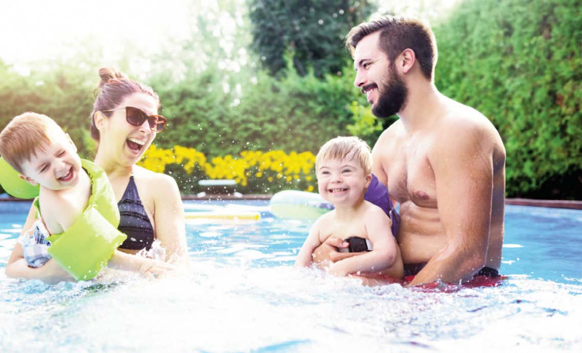 FAMILY IN A SWIMMING POOL