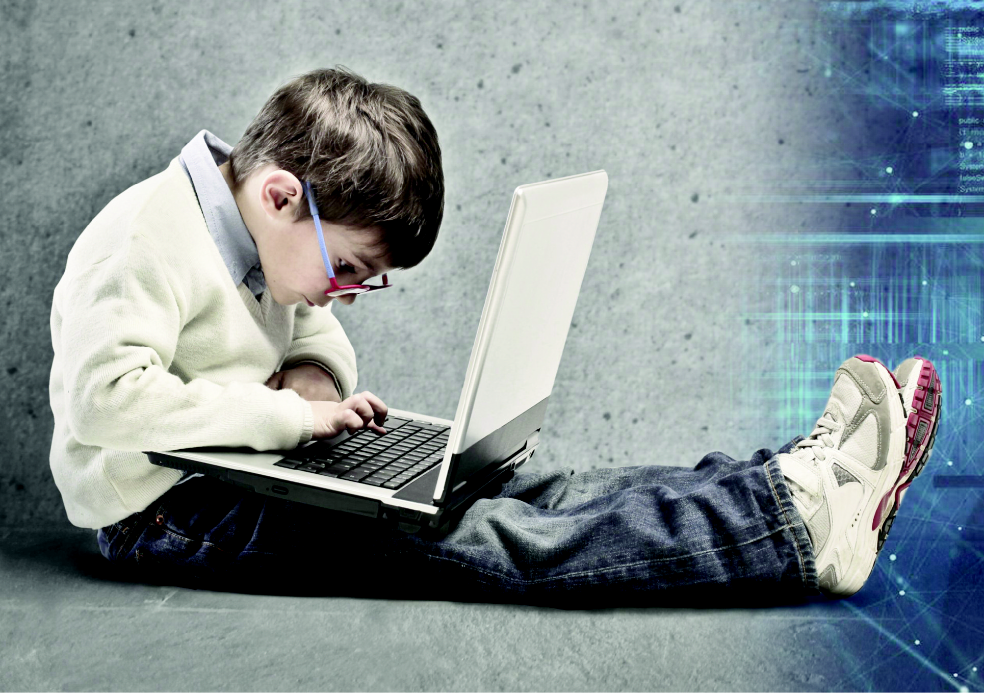 Child with notebook computer